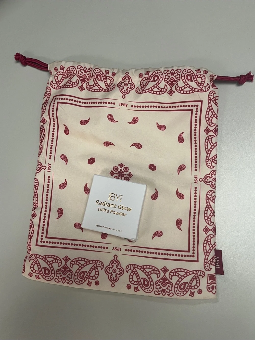 IBY Radiant Glow Hilite Powder — Pink and Burgundy Cosmetic bag